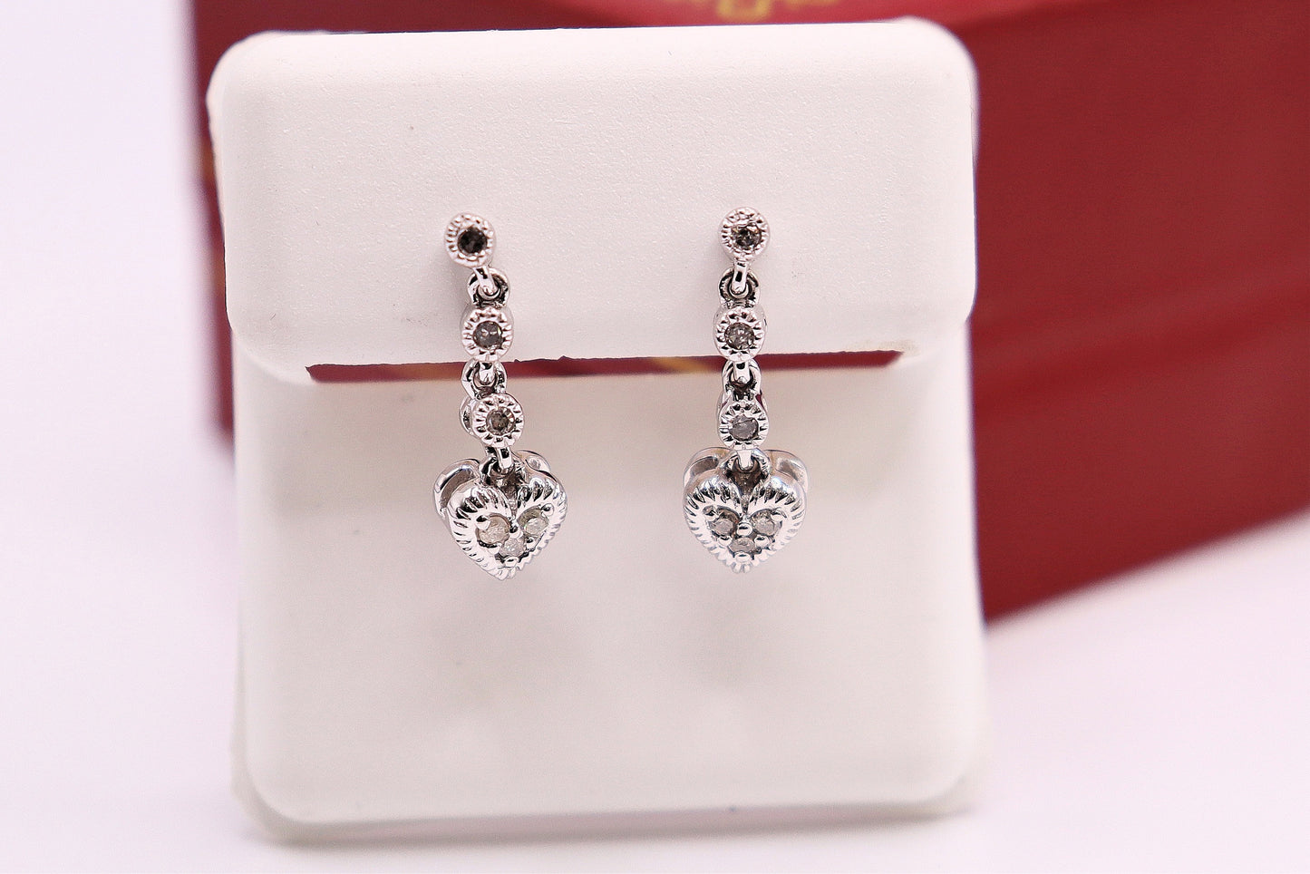 Boucles d’oreilles en or blanc avec diamants